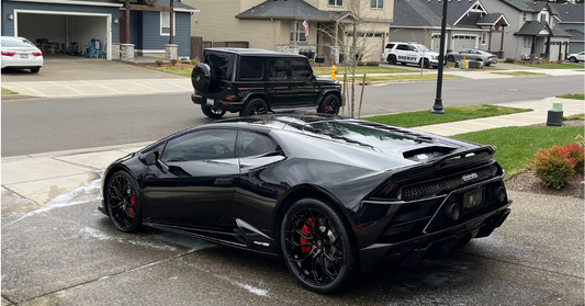 Full detail on Black Lamborghini Huracán in a residential driveway in Portland Oregon by Cruz Detailing